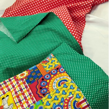 Бязь набивная зеленого цвета в белый горошек