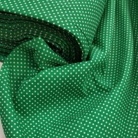 Бязь набивная зеленого цвета в белый горошек