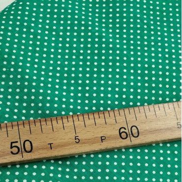 Бязь набивная зеленого цвета в белый горошек