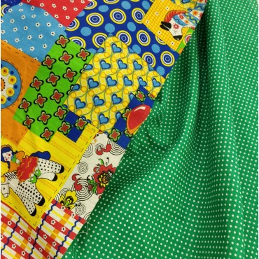 Бязь набивная зеленого цвета в белый горошек